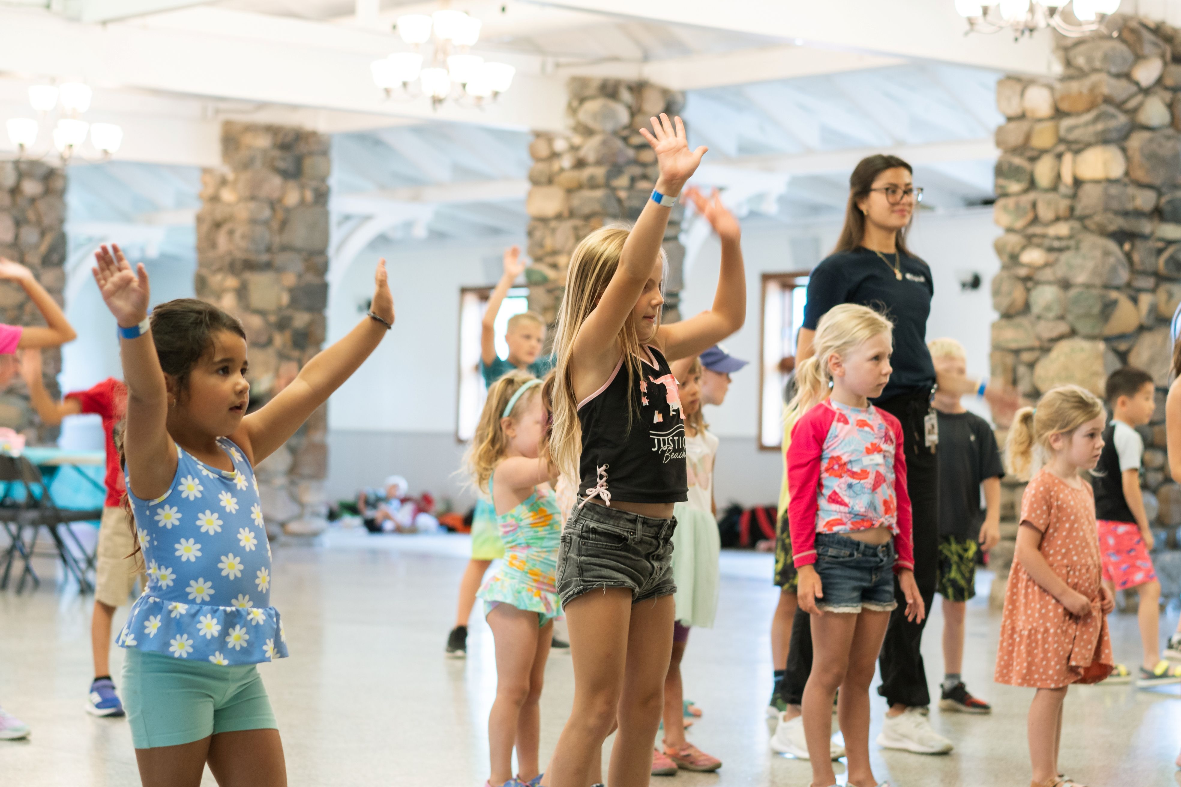 Kids dance together at summer camp