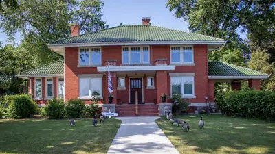 Exterior red brick homestead house 