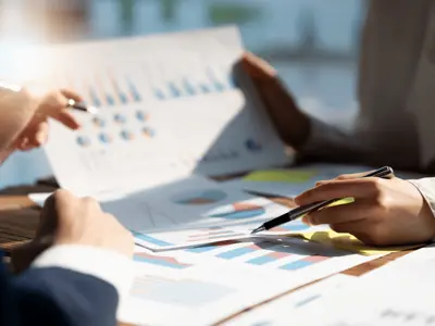 People review a document together