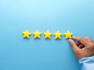 Man adds a fifth star to a line of stars