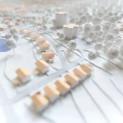 3D model shows a city plan with houses and trees