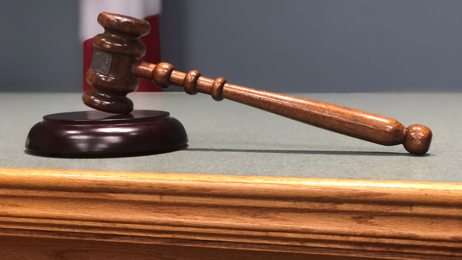 Mayor's gavel sits on wooden desk