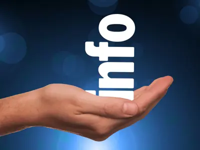 The word "info" rests in the palm of someone's hand