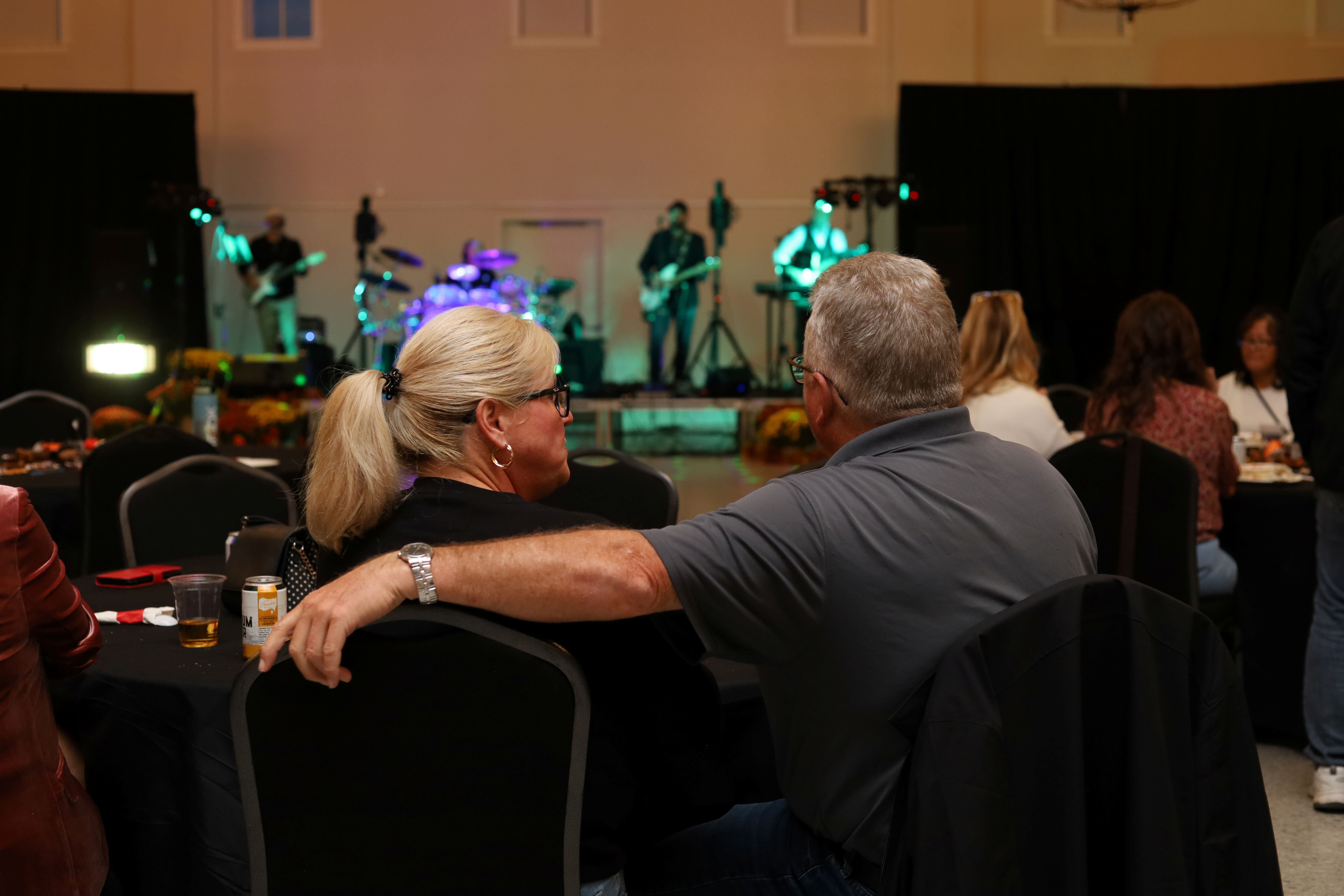 A couple enjoys live music at the Great Migration Kick off