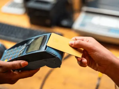 Debit card is tapped on machine