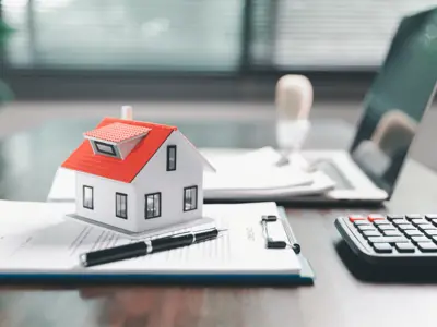 Model home with house keys